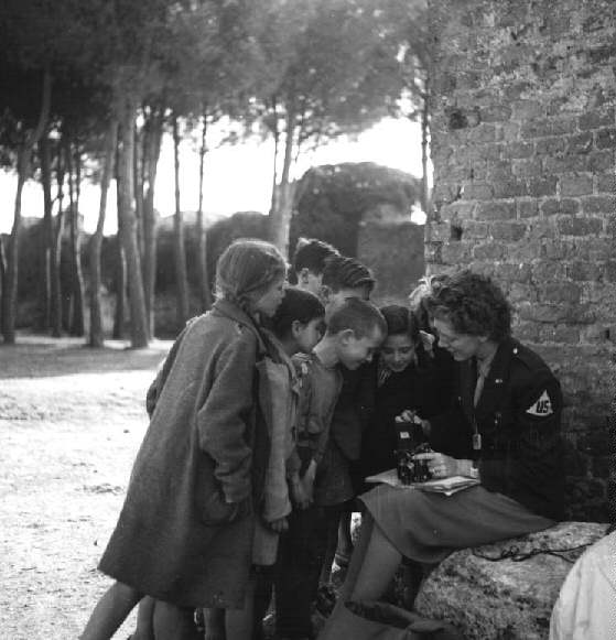 Frissell with Europe's Children [Toni Frissell with children], March 1945